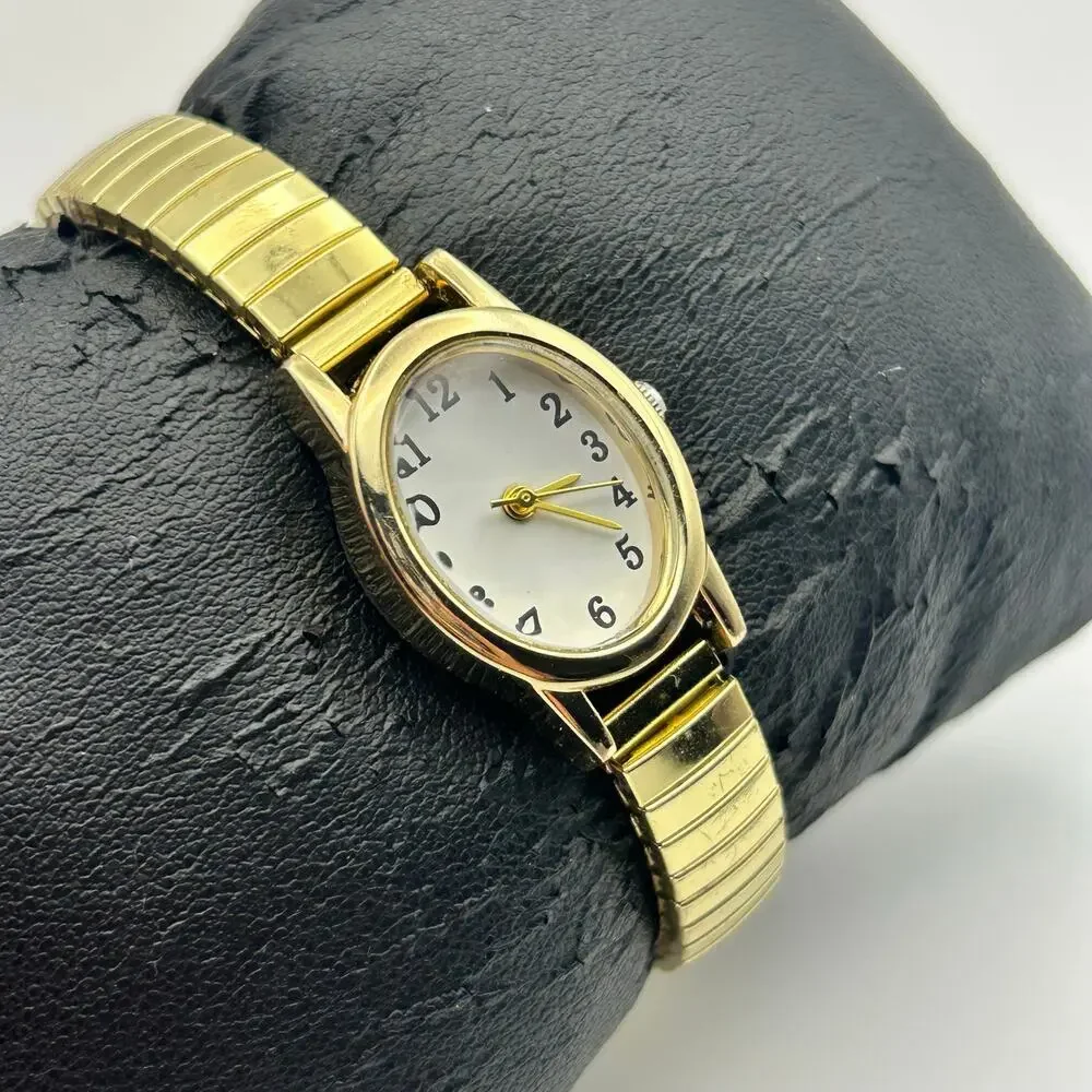 Gold-tone Oval Case Stainless Steel Stretch Band Women’s Watch Working